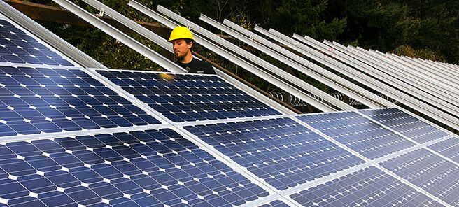 Installing_solar_panels_(3049874118)